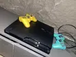 Used Sony PlayStation 3 Slim with 2 Controllers - 1