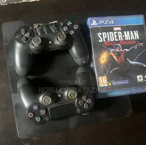 Used PS4 Slim Console with 6 Games