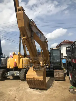 Caterpillar 320BL Excavator - Wadda Akawo
