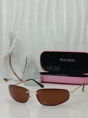 Miu Miu Rimless Cat-Eye Sunglasses Gold Accents