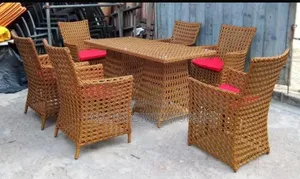 Premium 6-Seater Outdoor Rattan Dining Set tare da Cushions