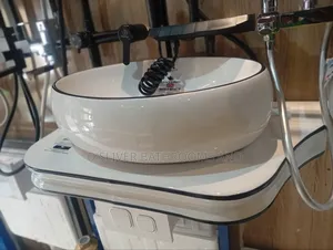 White Countertop Basin with Black Trim
