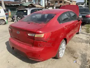 2012 Kia Rio LX 4dr Sedan 1.6L Manual Red