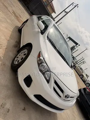 2012 Toyota Corolla LE Sedan - White