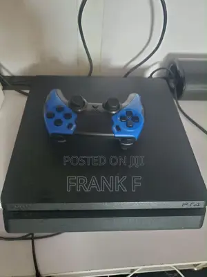 PS4 Slim 1TB tare da Wasanni 6 da Kwamfuta 1
