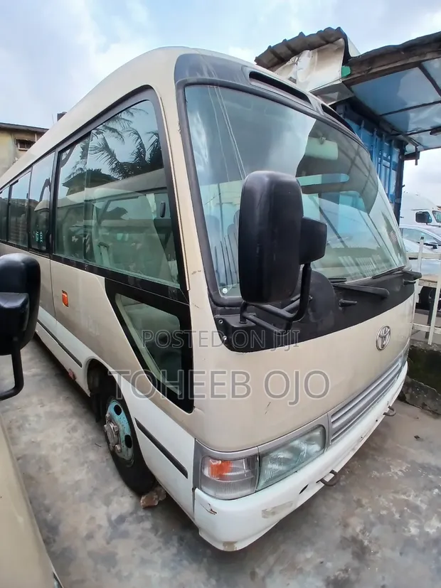 Toyota Coaster 2017 Brown - 1