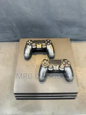 PS4 Pro with 2 Controllers and 10 Games