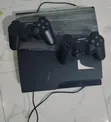 PlayStation 3 with Two Controllers - 1