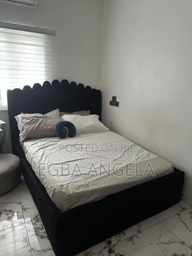 Neatly Used 4x6 Bed Frame with Storage - 1