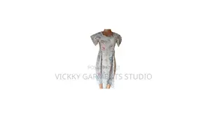 Vickky Wears White Sweetheart Neckline Dress