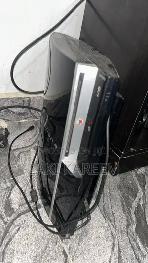 PS3 Fat Console with Two Controllers