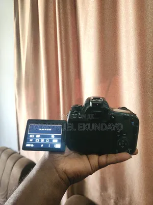 Canon 77D (9000D) DSLR with 18-55mm Lens, 2 Batteries, Bag