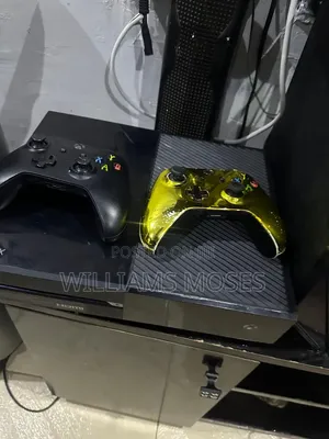 Xbox One with 2 Controllers and 5 Games