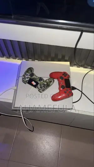 Used PS4 Console with 2 Controllers and Games