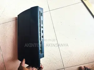 PlayStation 3 Slim with 2 Controllers and 5 Games