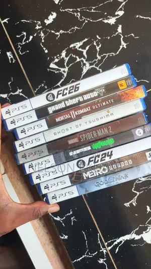 PS5 Slim Console with 2 Controllers and 9 Games