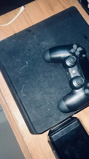 PlayStation 4 Slim 512GB with 7 Games