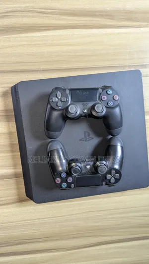 PS4 Console with 2 Controllers and Games
