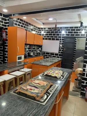 Home Interiors Kitchen Cabinets - Orange