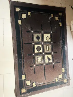 Used Brown Center Rug