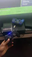 Used PlayStation 4 (124GB) with 2 Controllers - 1