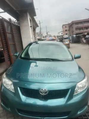 2010 Toyota Corolla LE Sedan - Babu Hatsari