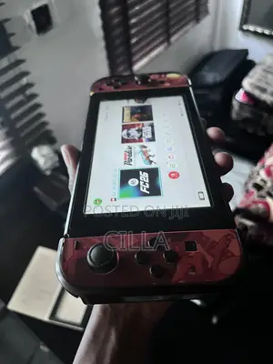 Nintendo Switch OLED with 10 Games & Premium Accessories