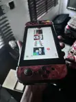 Nintendo Switch OLED with 10 Games & Premium Accessories - 1