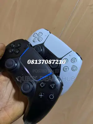 PS5 Slim + 2 Controllers + 2 Games