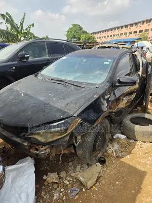 2014 Toyota Corolla L Sedan - An Amfani Da Ita