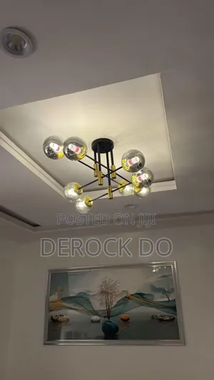 Chandelier Na Zamani Na Sputnik Tare Da Zane A Bango